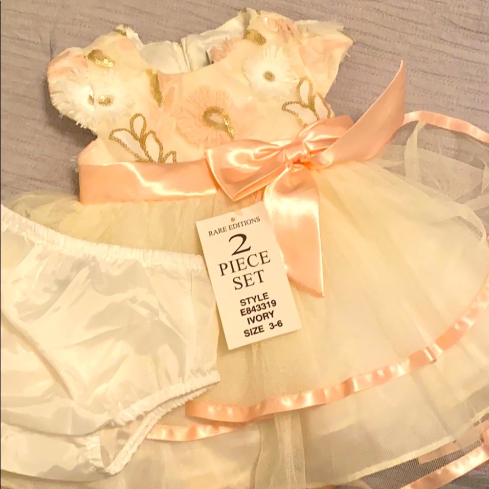 Brand new with tags 3-6 months dress